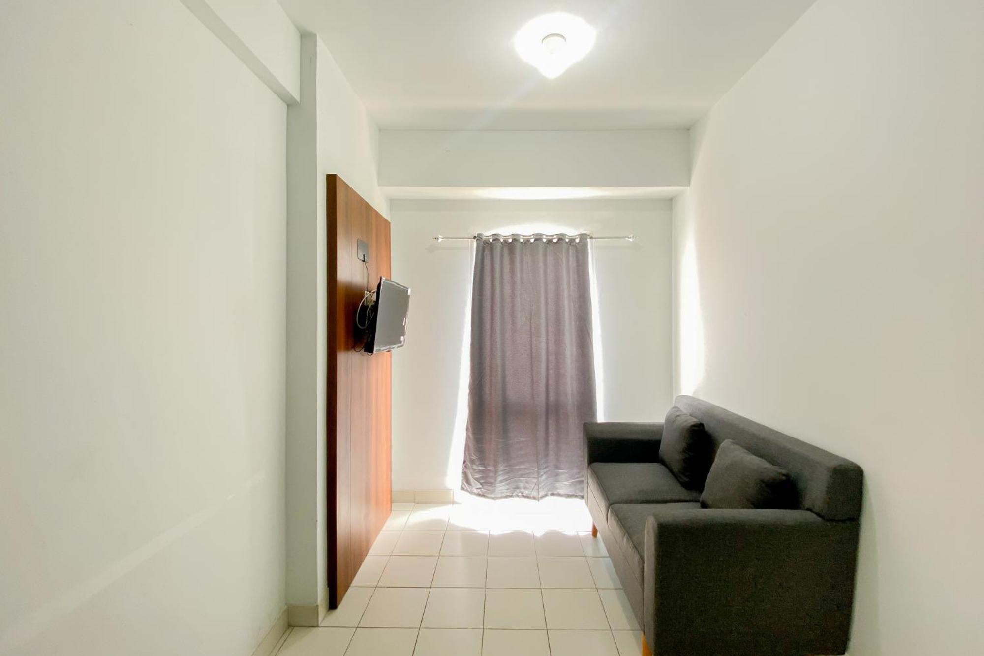 Simply Look 1br With Extra Patraland Urbano By Travelio Bekasi