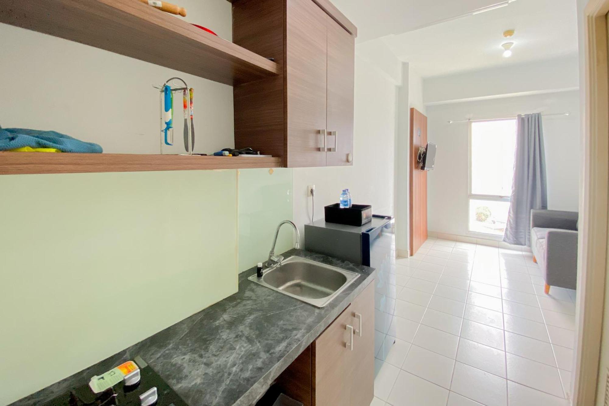 Simply Look 1br With Extra Patraland Urbano By Travelio Bekasi